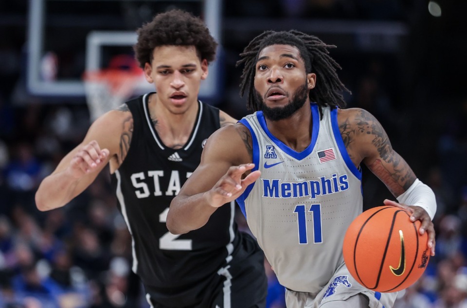 <strong>University of Memphis guard Tyrese Hunter (11) brings the ball up the court during a Dec. 21, 2021 game against Mississippi State.</strong> (Patrick Lantrip/The Daily Memphian)