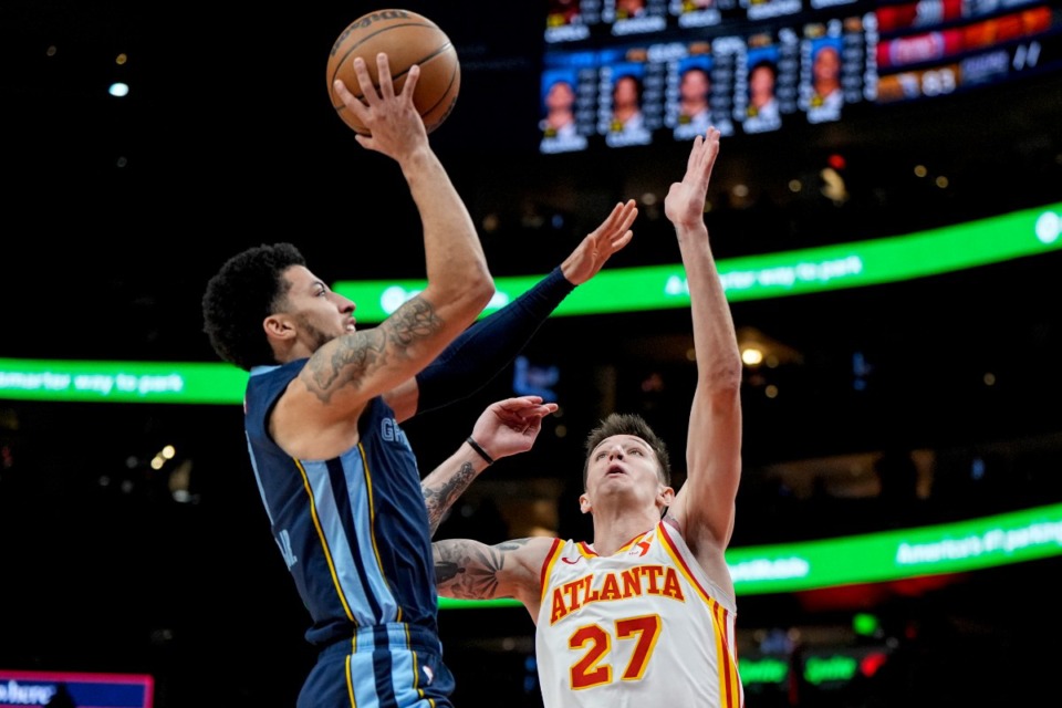 <strong>Memphis Grizzlies guard Scotty Pippen Jr. (1) shoots against Atlanta Hawks guard Vit Krejci (27) during the first half of an NBA basketball game, Saturday, Dec. 21, 2024, in Atlanta.</strong> (Mike Stewart/AP)