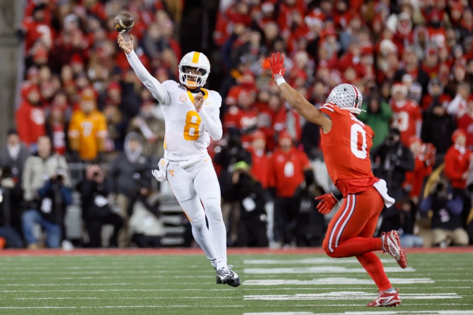 <strong>Tennessee quarterback Nico Iamaleava throws a pass against Ohio State during the first half in the first round of the College Football Playoff, Saturday, Dec. 21, 2024, in Columbus, Ohio.</strong> (Jay LaPrete/AP)