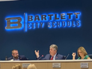 <strong>Bartlett City Schools extended Superintendent David Stephens&rsquo;, center, contract. He will lead the district for a least 4 more years. He is flanked by board members Bryan Woodruff, left, and Erin Berry, right.</strong> (Michael Waddell/The Daily Memphian file)