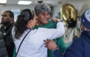 <strong>Ms. Girlee's owner Jimmie Leach is greeted by a line of hugs while walking in to her North Memphis restaurant, which closed Friday, Dec. 20, after 10 years.</strong> (Patrick Lantrip/The Daily Memphian)