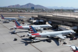 <strong>American Airlines planes wait at gates at Phoenix Sky Harbor International Airport Friday, July 19, 2024, in Phoenix.</strong> (Ross D. Franklin/AP File)