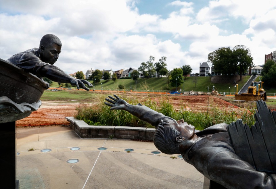 <strong>The statue of Tom Lee in the park named for him is surrounded by construction in 2021.</strong> (Mark Weber/The Daily Memphian file)