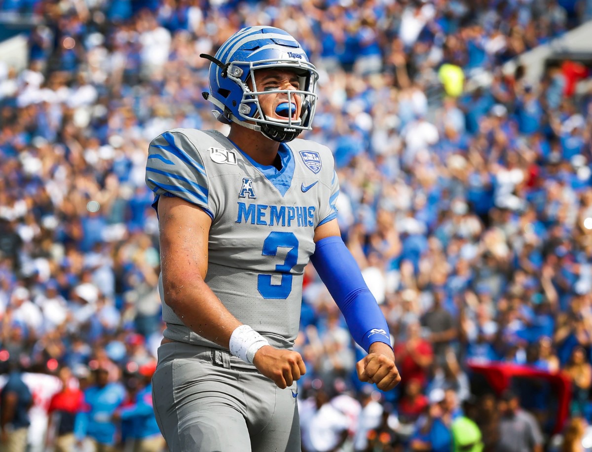 <strong>Memphis quarterback Brady White celebrates a touchdown against the Ole Miss defense during action in their NCAA football game at the Liberty Bowl Memorial Stadium Saturday, August 31, 2019.</strong> (Mark Weber/Daily Memphian)