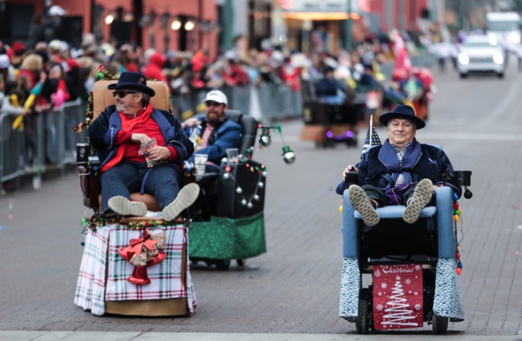 <strong>The Krewe Kruisers putter down Beale Street during the AutoZone Liberty Bowl Parade Dec. 26, 2024.</strong> (Patrick Lantrip/The Daily Memphian)