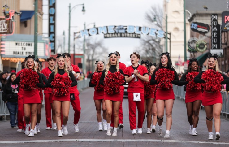 <strong>The Texas Tech cheer squad kicks off the AutoZone Liberty Bowl Parade Dec. 26, 2024.</strong> (Patrick Lantrip/The Daily Memphian)