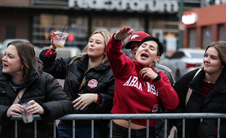 <strong>&ldquo;Woooooooo. Pig. Sooie!&rdquo;&nbsp;Arkansas fans call the hogs during the AutoZone Liberty Bowl Parade Dec. 26, 2024.</strong> (Patrick Lantrip/The Daily Memphian)