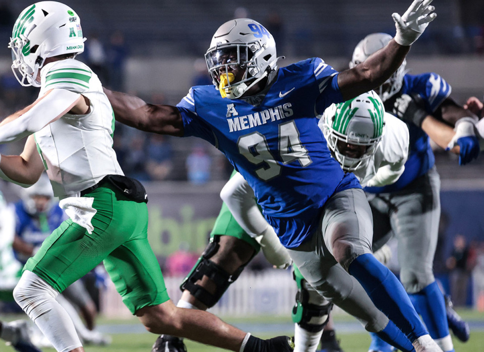 <strong>University of Memphis lineman William Whitlow Jr. (94) tries to bring down the opposing quarterback during a game against North Texas Oct. 19, 2024.</strong> (Patrick Lantrip/The Daily Memphian file)