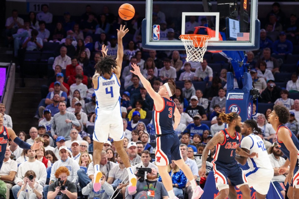 <strong>Memphis Tigers guard PJ Haggerty (4) shoots the ball against the Ole Miss Rebels during the first half at FedExForum on Saturday, Dec. 28, 2024.</strong> (Wes Hale/Special to The Daily Memphian)