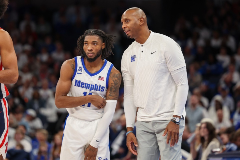 <strong>Memphis Tigers Head Coach Penny Hardaway and guard Tyrese Hunter (11) talk during the second half against the Ole Miss Rebels at FedExForum on Saturday, Dec. 28, 2024.</strong> (Wes Hale/Special to The Daily Memphian)