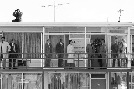 <strong>President Jimmy Carter and first lady Rosalynn Carter, along with Coretta Scott King and United Nations Ambassador Andrew Young, right, center, stand on the balcony of the hotel in Memphis, Dec. 9, 1978 where Martin Luther King Jr. was assassinated. Carter stopped at the site and placed a wreath on the door while en route to the airport for a flight to Washington. On the roof at upper left, a security agent keeps a lookout with binoculars.</strong> (AP file)