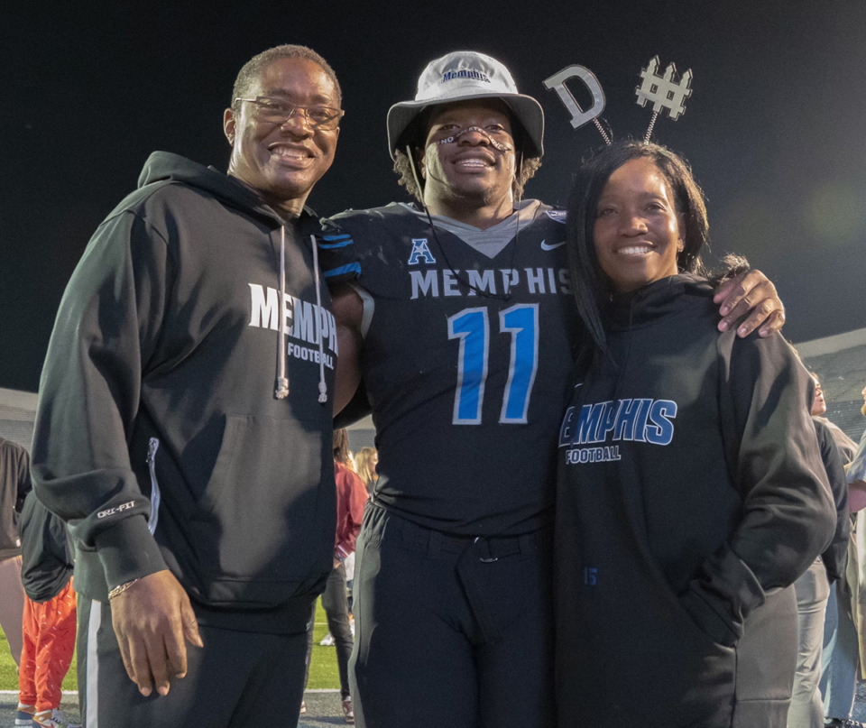 <strong>Pictured with Chandler Martin (center) is his father, Jeff Martin and his mother, Sherlonda Martin (right).</strong> (Courtesy Madison Penke/4 Star Sports Media)