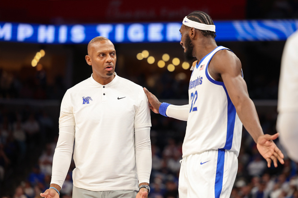 <strong>Memphis Tigers Head Coach Penny Hardaway and center Moussa Cisse (32) talk during the second half against the Ole Miss Rebels at FedExForum on Saturday, Dec. 28, 2024.</strong> (Wes Hale/Special to The Daily Memphian)