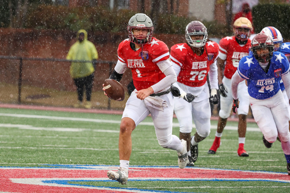 <strong>Quarterback Brody Whittaker is among the five players from Class 1A state champion, Memphis Academy of Science and Engineering (MASE) selected by the Tennessee Sports Writers All-State football teams for Class 1A, Class 2A and Class 3A. Whittaker (1) scrambles during the AutoZone Liberty Bowl High School All-Star Game on Dec. 14, 2024.</strong> (Wes Hale/Special to The Daily Memphian)