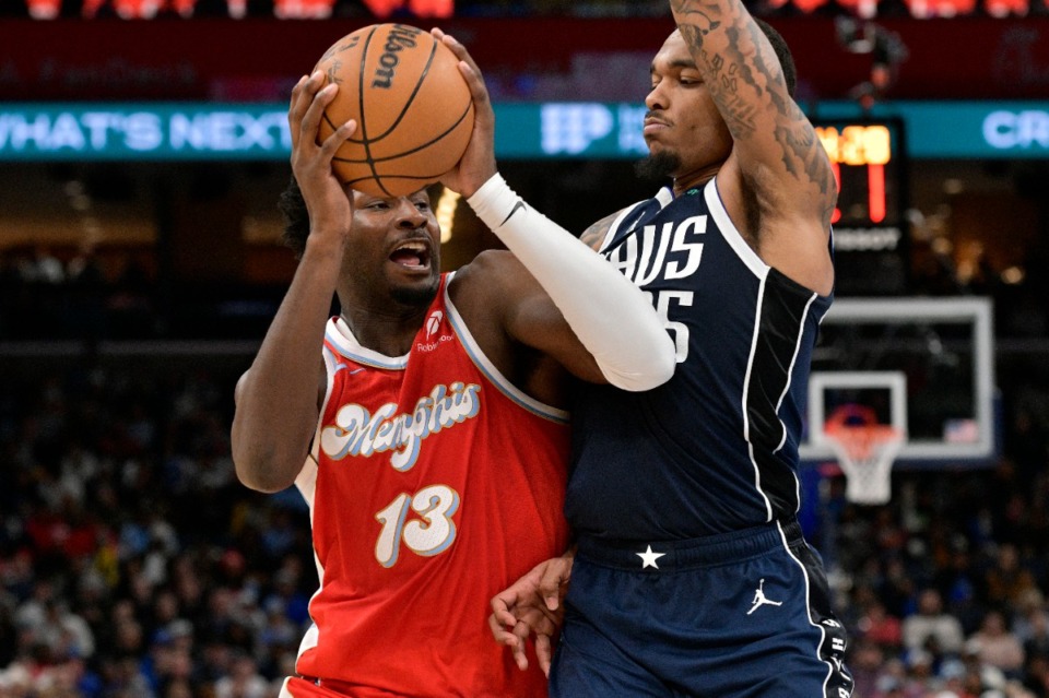 <strong>Memphis Grizzlies forward Jaren Jackson Jr. (13) shoots against Dallas Mavericks forward P.J. Washington, right, on the way to 35 points Monday, Jan. 6, 2025.</strong> (Brandon Dill/AP)