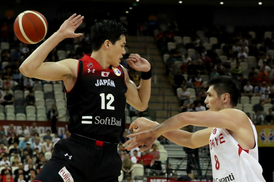 <strong>Turkey's Ersan Ilyasova throws the ball past Japan's Yuta Watanabe during a Group E match of the FIBA Basketball World Cup at the Shanghai Oriental Sports Center in Shanghai on Sunday, Sept. 1, 2019. Turkey defeats Japan 86-67.</strong> (AP Photo/Ng Han Guan)