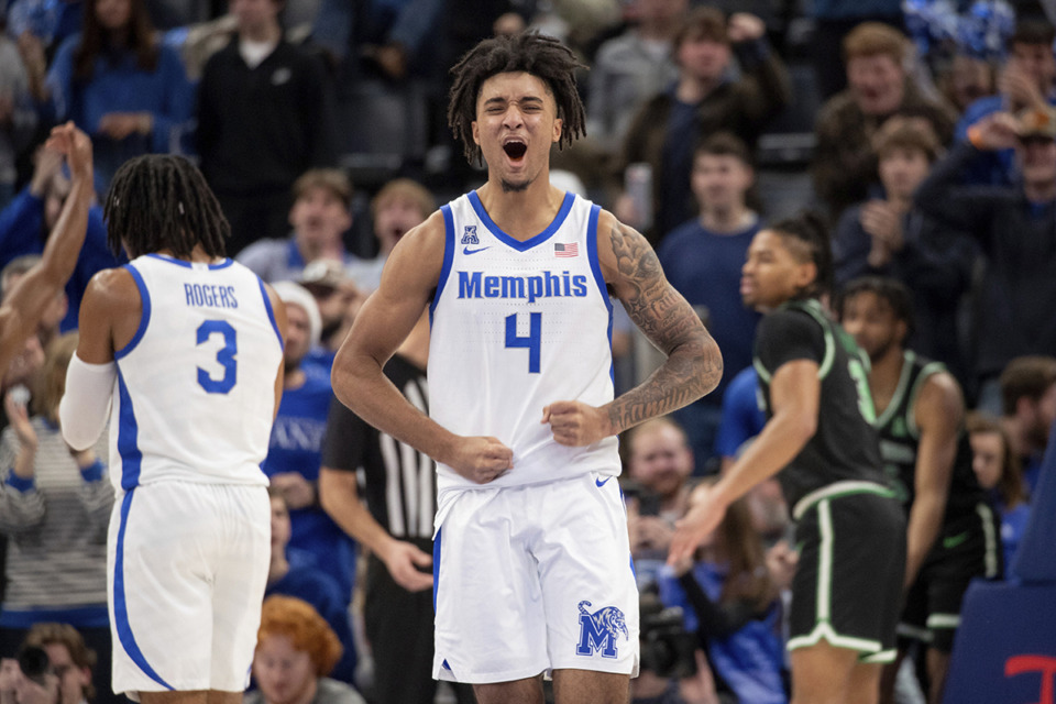 <strong>Memphis guard PJ Haggerty (4) celebrates after scoring against North Texas during the second half of an NCAA college basketball game Jan. 5.</strong> (Nikki Boertman/AP file)