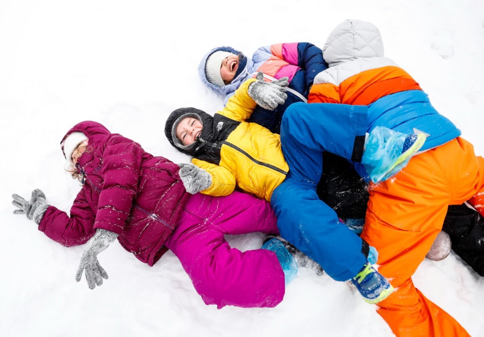 <strong>During a heavy snow storm, siblings (left to right) Waverly, 6; Ronan, 4; Sage, 8; and Foster, 8; play with their father on Monday, Feb. 15, 2021.</strong> (Mark Weber/The Daily Memphian file)&nbsp;