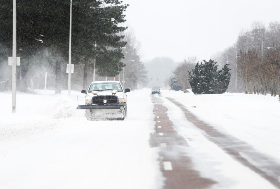 <strong>A plow clears snow on Wolf River Boulevard on Wednesday, Feb. 17, 2021, in Germantown.</strong> (Mark Weber/The Daily Memphian file)