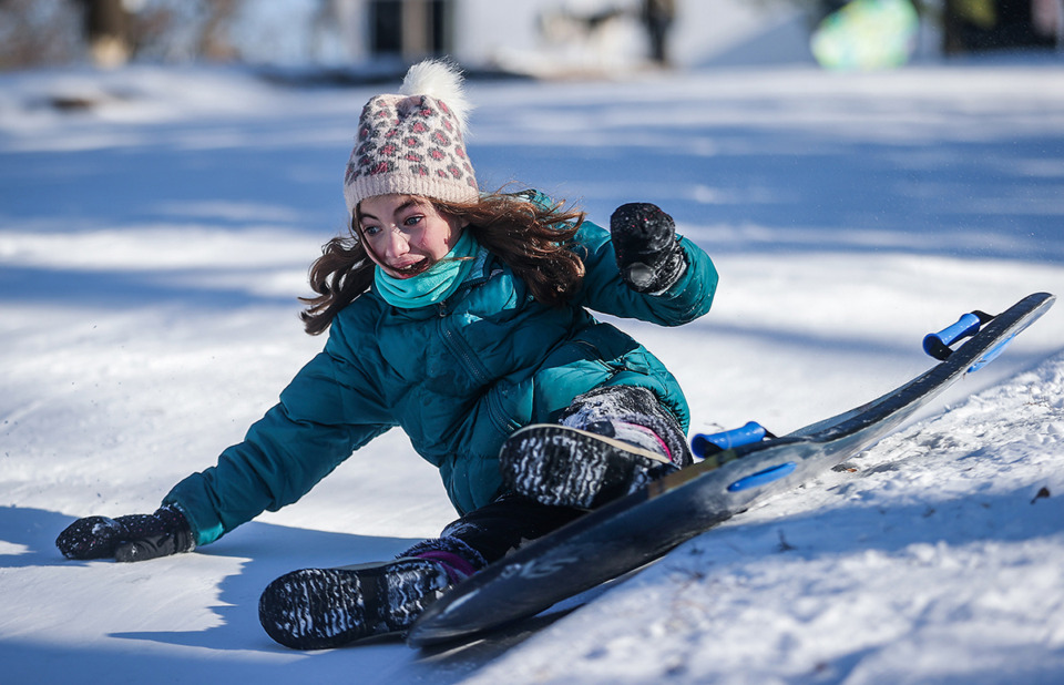 <strong>Kids use the hill leading up to the Brooks Museum to sled Jan. 16, 2024.</strong> (Patrick Lantrip/The Daily Memphian file)