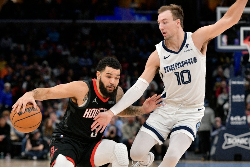 <strong>Memphis Grizzlies guard Luke Kennard (10) battlesHouston Rockets guard Fred VanVleet (5) Thursday, Jan. 9, 2025.</strong> (Brandon Dill/AP)