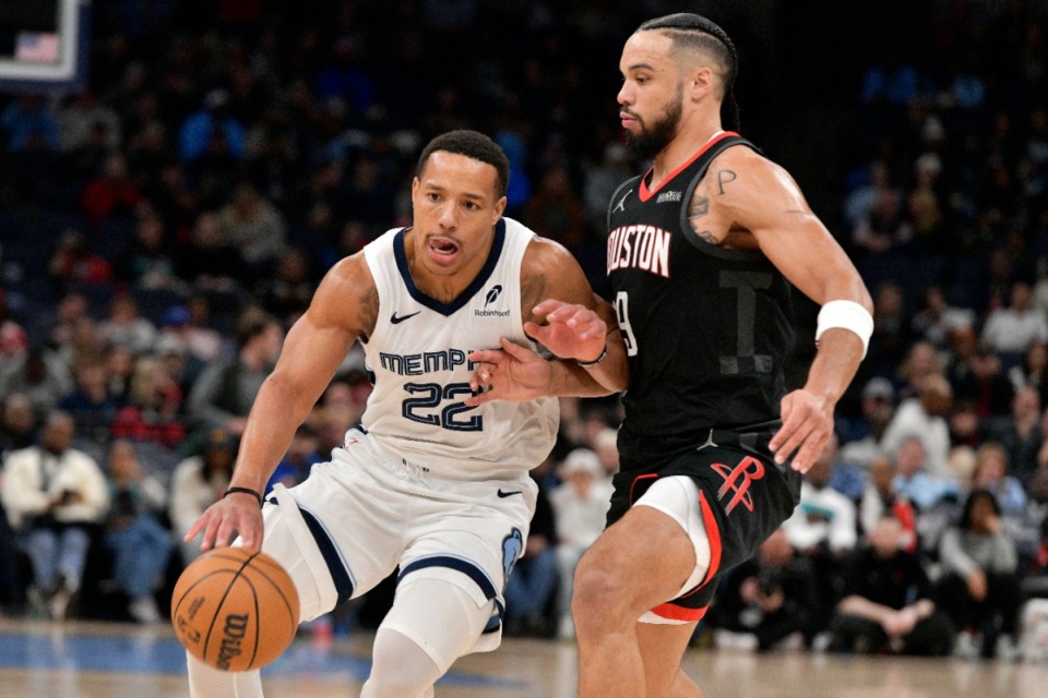 <strong>&ldquo;We have the utmost faith in coach,&rdquo; Grizzlies guard Desmond Bane (left) said.&nbsp;&ldquo;We trust in him and believe in him.&rdquo; Houston Rockets forward&nbsp;(and former Grizzly) Dillon Brooks is at right.</strong> (Brandon Dill/AP)