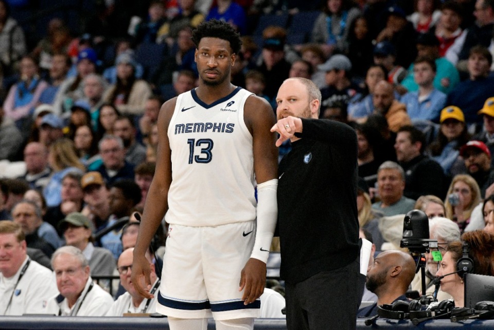 <strong>&ldquo;I made a mistake,&rdquo; Memphis Grizzlies coach Taylor Jenkins (right) said of his decision Thursday, Jan. 9, 2025, to call timeout as Desmond Bane was shooting. Forward Jaren Jackson Jr. stands at left.</strong> (Brandon Dill/AP)