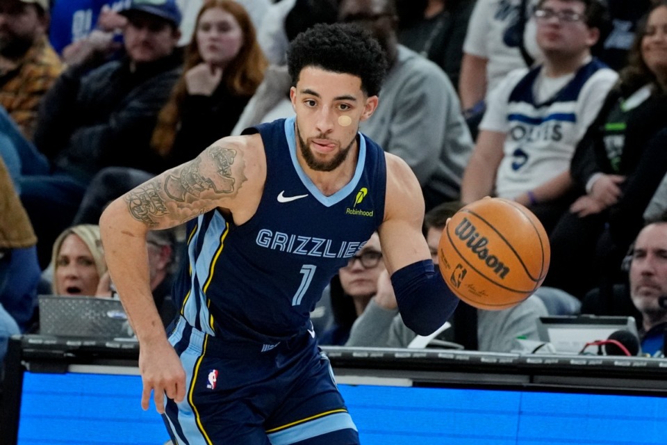 <strong>Memphis Grizzlies guard Scotty Pippen Jr. steals the ball from the Minnesota Timberwolves and heads up court in the second quarter of an NBA basketball game Saturday, Jan. 11, 2025, in Minneapolis.</strong> (Bruce Kluckhohn/AP)