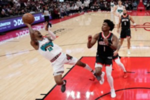 <strong>Memphis Grizzlies guard Ja Morant (12) shoots over Houston&rsquo;s Amen Thompson (1) on Monday, Jan. 13, 2025, in Houston.</strong> (David J. Phillip/AP)