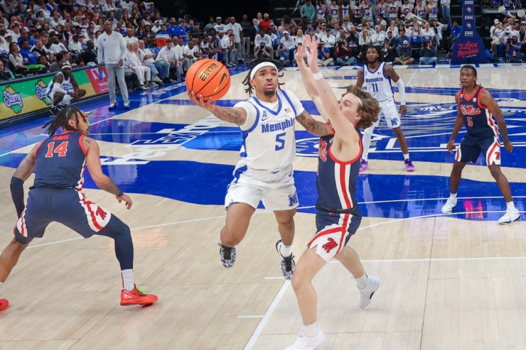 Memphis Tigers guard Dante Harris (5) shoots the ball against the Mississippi Rebels during the first half at FedExForum on Saturday, Dec. 28, 2024. (Wes Hale/Special to The Daily Memphian)