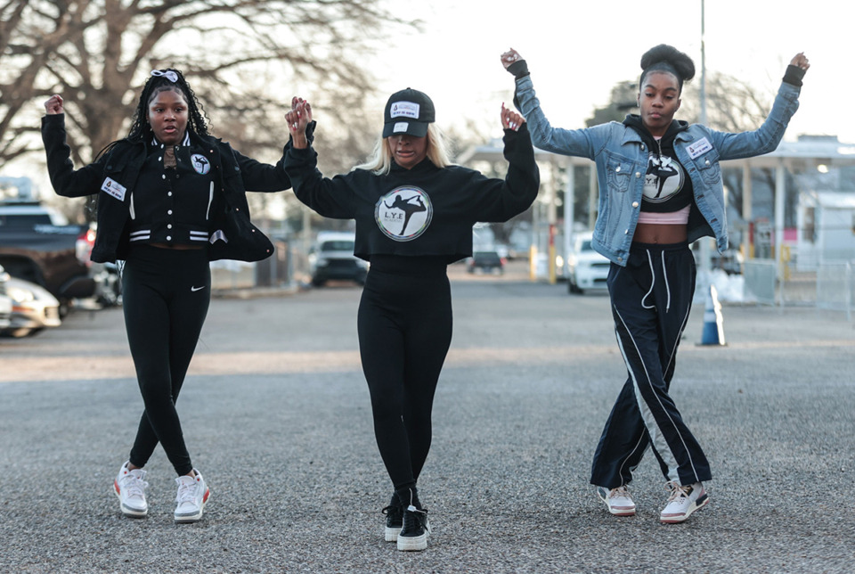 <strong>Kynslie Thompson, (from left) Ladia Yates, Markena Hughes dance to &ldquo;Let her Cook&rdquo; by GloRilla while waiting to get into a Jan. 14, 2025 MSCS school board meeting</strong>. (Patrick Lantrip/The Daily Memphian)