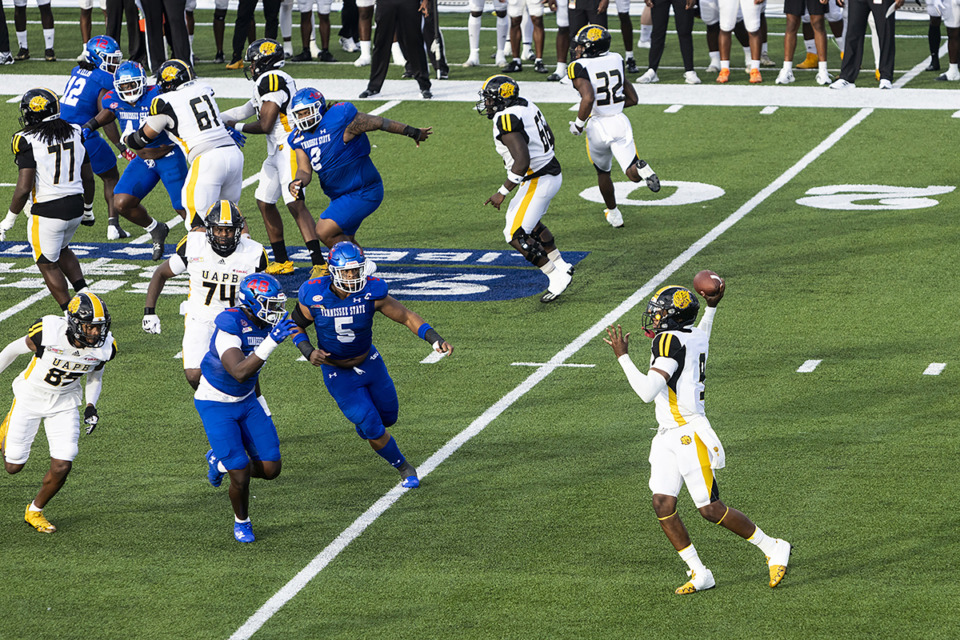 <strong>Arkansas Pine-Bluff&rsquo;s Mekhi Hagens attempts a pass during the Southern Heritage Classic at Simmons Bank Liberty Stadium.</strong> (Brad Vest/Special to The Daily Memphian)