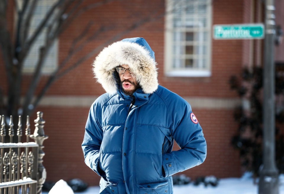 <strong>Gabriel McGaba braved bitter temperatures as he walked Downtown on Wednesday, January 17, 2024.</strong> (Mark Weber/The Daily Memphian)