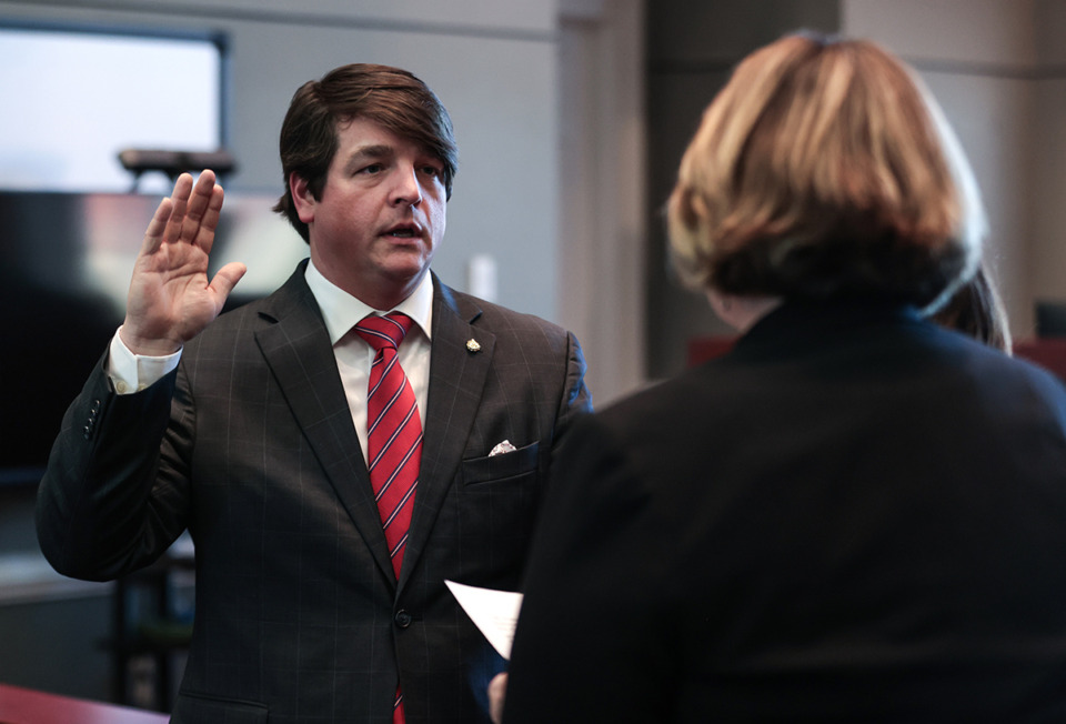 <strong>Collierville alderman Charles Hall gets sworn in after a Jan. 16, 2025 Board of Mayor and Aldermen meeting.</strong> (Patrick Lantrip/The Daily Memphian)