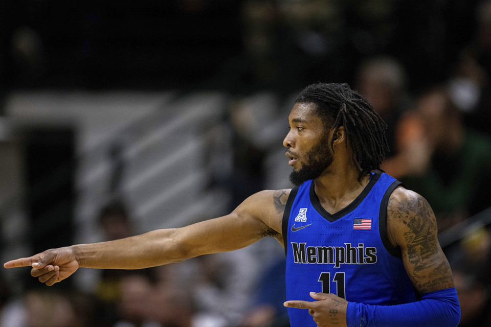 <strong>Memphis guard Tyrese Hunter (11) celebrates after a three-point basket against Charlotte during the first half of an NCAA college basketball game on Sunday, Jan. 19, 2025, in Charlotte, N.C.</strong> (Scott Kinser/AP Photo)