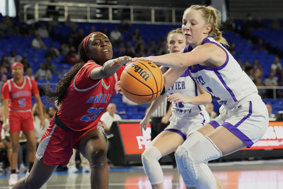 <strong>Bartlett&rsquo;s Faye Williams (25) and Sevier County&rsquo;s Aubree Laney, right, reach for the ball during the second half of a Class 4A game in the TSSAA BlueCross girls&rsquo; state basketball tournament Tuesday, March 7, 2023, in Murfreesboro. Williams is up for The Daily Memphian&rsquo;s high school</strong> <strong>girls basketball player of the week</strong>. (Mark Humphrey/Special to The Daily Memphian)