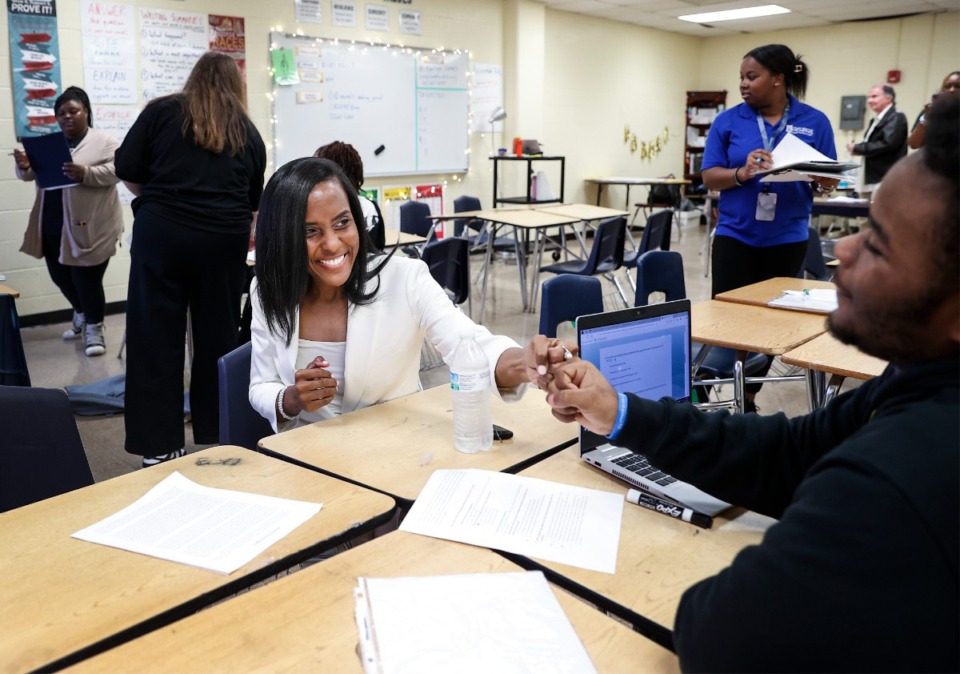 <strong>Memphis-Shelby County Schools Superintendent Marie Feagins fist bumps a student while touring Melrose High School on Monday, April 1, 2024.</strong> (Mark Weber/Daily Memphian file)