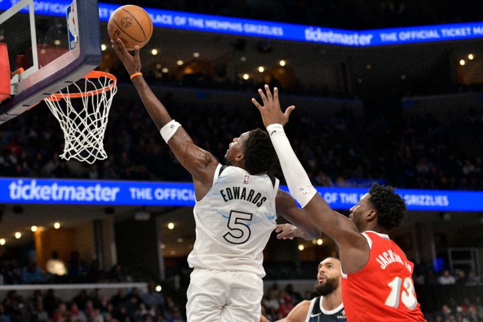 <strong>Minnesota Timberwolves guard Anthony Edwards (5) shoots ahead of Memphis Grizzlies forward Jaren Jackson Jr. (13) in the second half of an NBA basketball game Monday, Jan. 20, 2025, in Memphis.</strong> (Brandon Dill/AP)