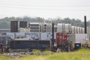 <strong>Emissions coming from the gas turbines powering xAI's supercomputer Aug. 9, 2024.</strong> (Benjamin Naylor/Daily Memphian file)