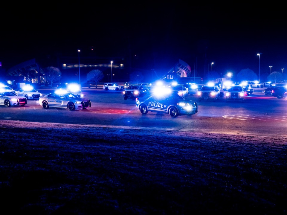 <strong data-stringify-type="bold">Memphis Police Officers as well as other police departments take part in a Sea of Blue Wednesday night, Jan. 22, for Charles Cathey. Cathey was a Memphis police officer who died after suffering a medical emergency in Downtown Memphis.</strong>&nbsp;(Brad Vest/Special to The Daily Memphian)