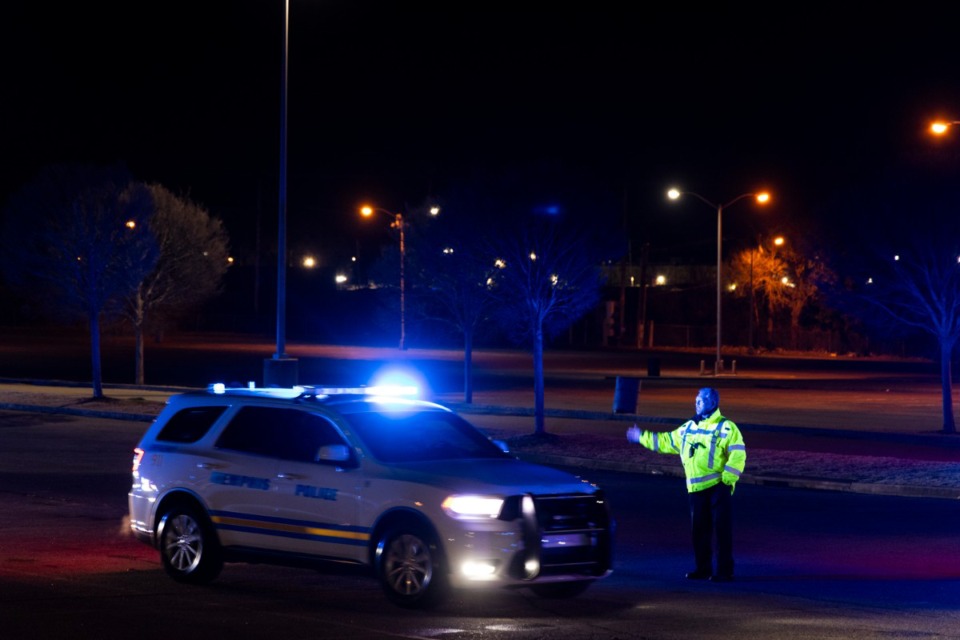 <strong data-stringify-type="bold">Memphis Police Officers as well as other police departments take part in a Sea of Blue Wednesday night, Jan. 22, for Charles Cathey. Cathey was a Memphis police officer who died after suffering a medical emergency in Downtown Memphis.</strong>&nbsp;(Brad Vest/Special to The Daily Memphian)