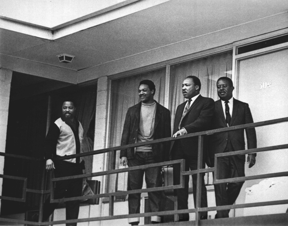 <strong>Martin Luther King Jr. stands with other civil rights leaders on the balcony of the Lorraine Motel in Memphis on April 3, 1968, a day before he was assassinated at approximately the same place. From left are Hosea Williams, Jesse Jackson, King, and Ralph Abernathy.</strong> (Charles Kelly/AP Photo file)