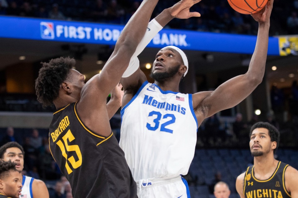 <strong>Wichita State center Quincy Ballard (15) defends against Memphis center Moussa Cisse (32)&nbsp; on Thursday, Jan. 23, 2025.</strong> (Nikki Boertman/AP)