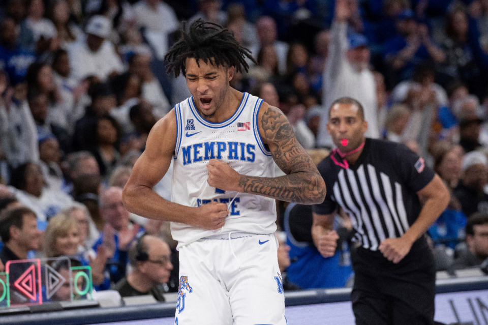 <strong>Memphis guard PJ Haggerty, foreground, celebrates during the second half of an NCAA college basketball game against UAB, Sunday, Jan. 26, 2025, in Memphis.</strong> (Nikki Boertman/AP Photo)