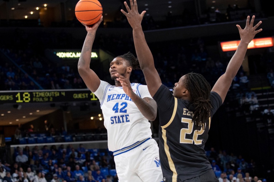 <strong>Memphis forward Dain Dainja (42) shoots defended by UAB forward Bradley Ezewiro (22) during the first half of an NCAA college basketball game Sunday, Jan. 26, 2025, in Memphis.</strong> (Nikki Boertman/AP Photo)