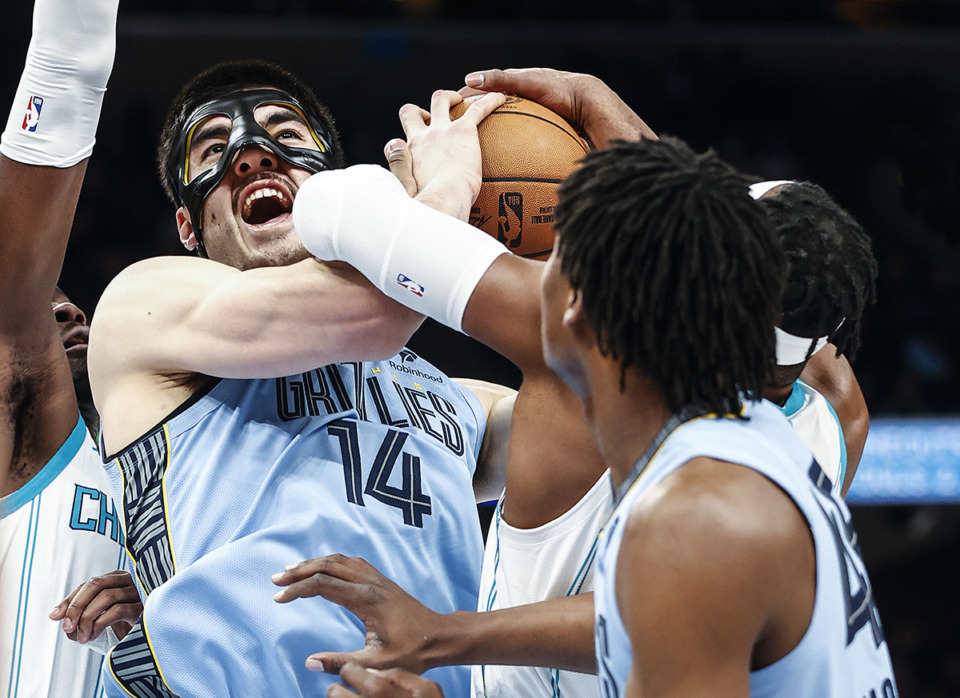 <strong>Memphis Grizzlies center Zach Edey battles for a rebound against the Charlotte Hornets during action on Wednesday, Jan. 22, 2025</strong>. (Mark Weber/The Daily Memphian)