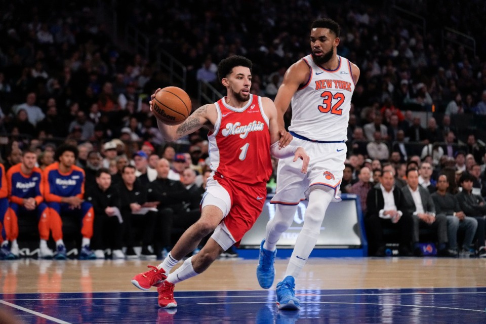 <strong>Memphis Grizzlies' Scotty Pippen Jr., left, moves around New York Knicks' Karl-Anthony Towns on Monday, Jan. 27, 2025, in New York.</strong> (Seth Wenig/AP)