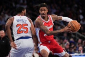 <strong>Memphis Grizzlies guard Ja Morant, right, charges New York&rsquo;s Mikal Bridges (25) on Monday, Jan. 27, 2025, in New York.</strong> (Seth Wenig/AP)