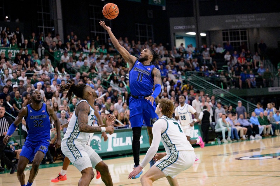 <strong>Memphis guard Tyrese Hunter (11) shoots against Tulane guard Rowan Brumbaugh (7) in New Orleans, Thursday, Jan. 30, 2025.</strong> (Matthew Hinton/AP)