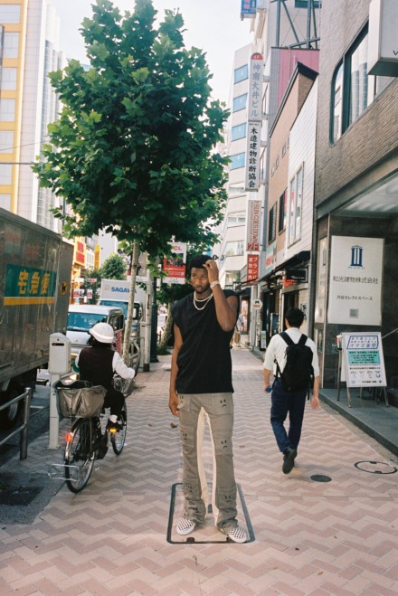 <strong>Jaren Jackson Jr. on the sidewalk in Tokyo.</strong> (Courtesy David Herrera)